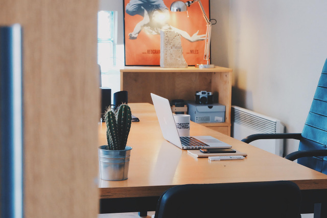 two people talking face to face in therapy office